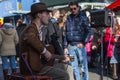 A Busker playing the Blues